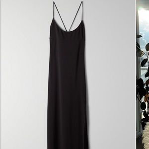 Long backless strappy black dress with slit